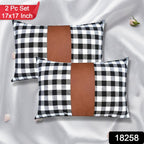 Close-up of the textured leather and cotton blend fabric of the cushion cover with an invisible zipper.