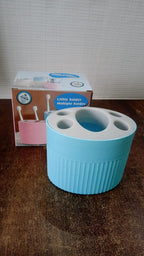 Bathroom countertop toothbrush and utility holder with waterproof design
