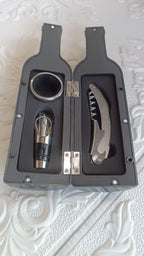 Wine bottle-shaped case with complete wine accessory set