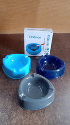 Angled view of plastic ashtray on wooden table