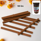 Loban Dhoop Stick burning in an incense holder, with smoke rising gently.