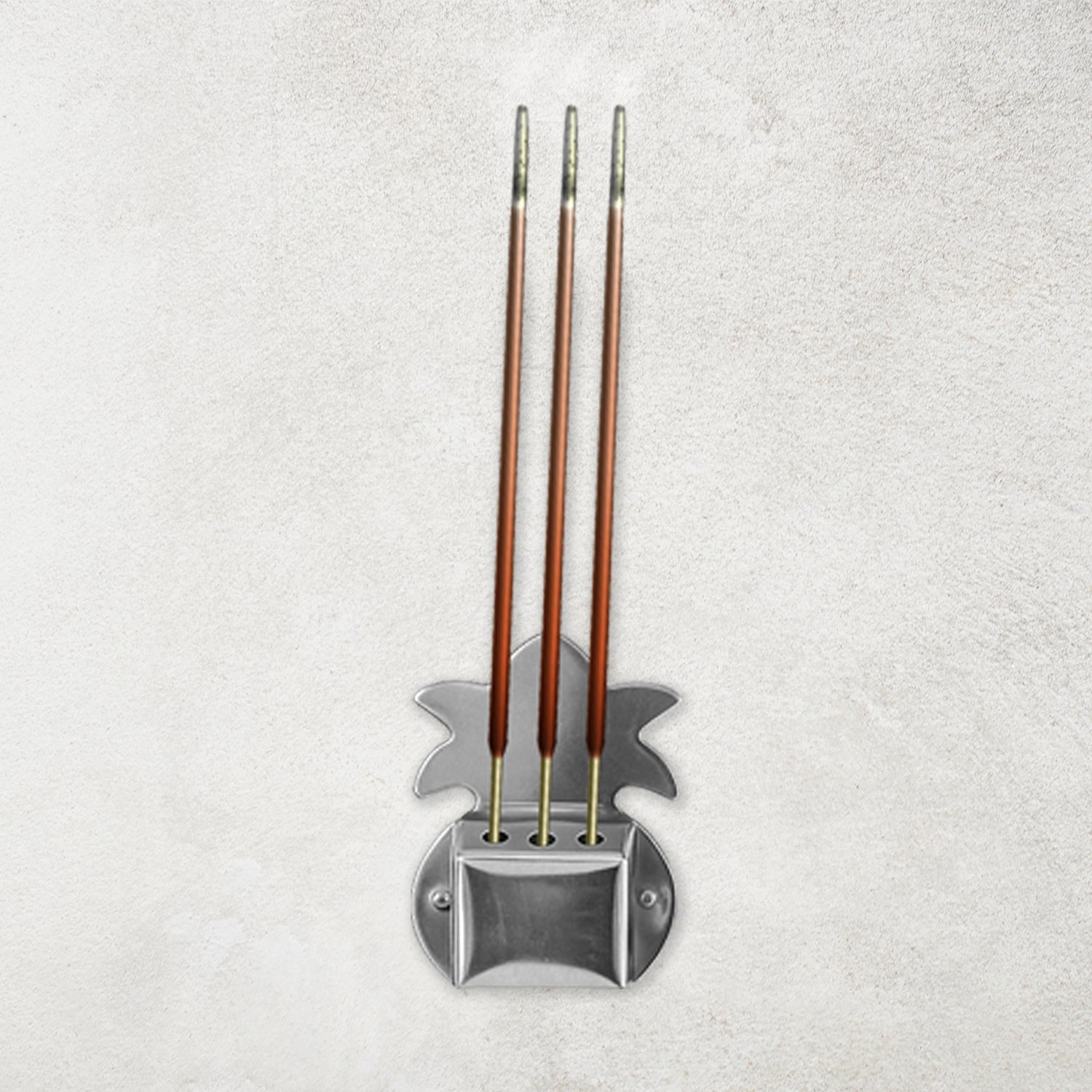 Set of three durable metal incense stick holders ideal for pooja room rituals.