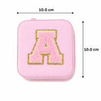 Close-up of the premium PU leather texture and smooth zipper of the Mini Travel Jewellery Box.