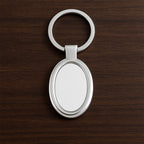 Sleek oval metal keychain showcasing durable build and chrome shine