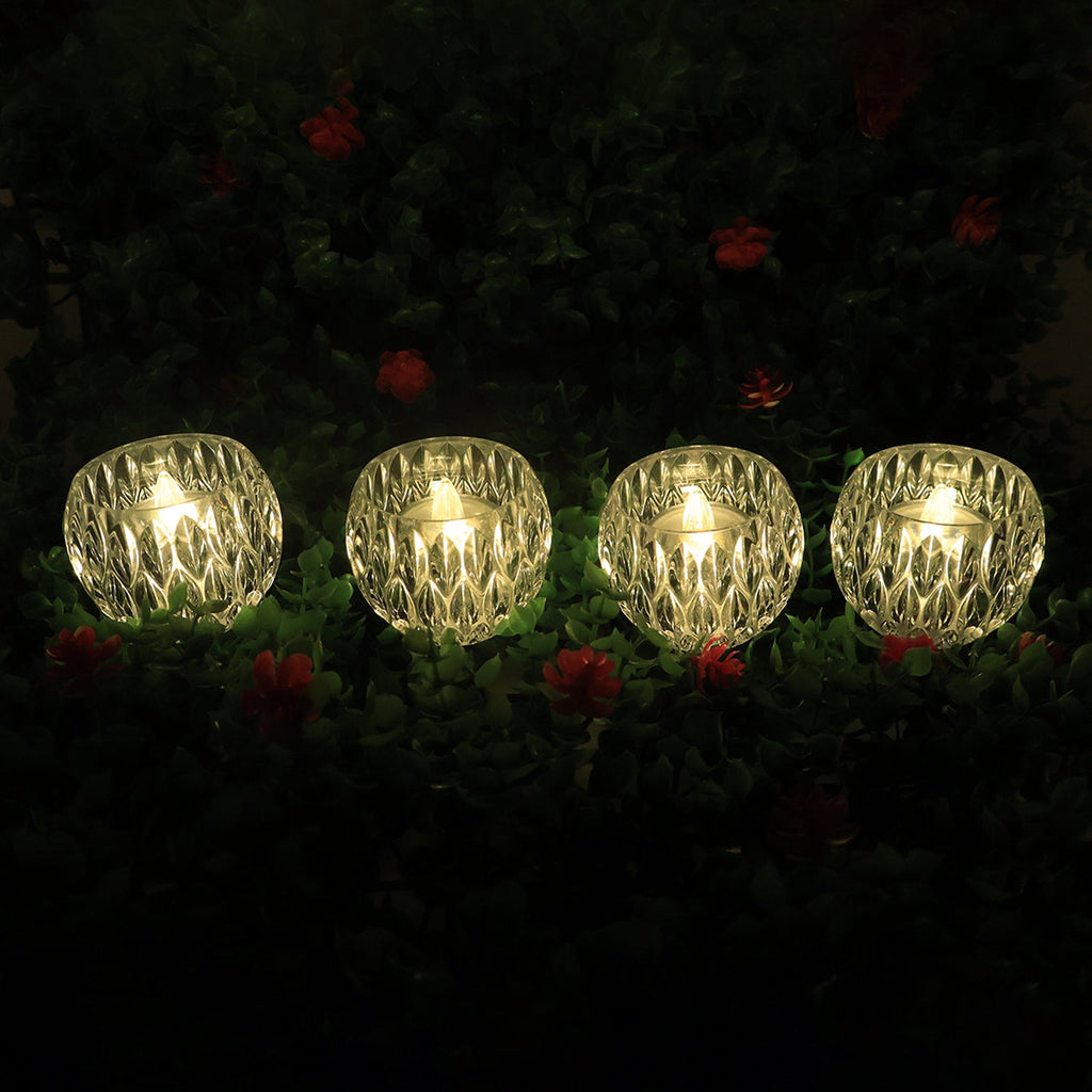 Crystal style LED candle light showcasing elegant diamond-cut body