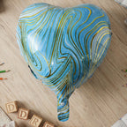 Blue marble heart balloon for photo corner