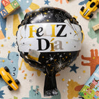 Round black and gold celebration foil balloon