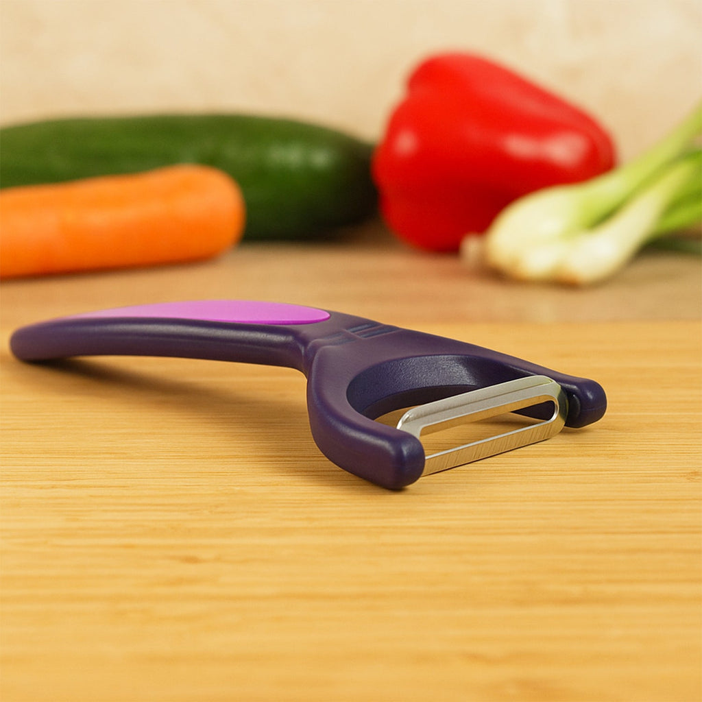 Dual tone vegetable peeler designed for comfortable grip and smooth peeling