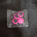 A collection of Round Fridge Magnets in multiple hues, perfect for home and office use.