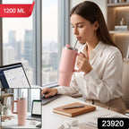 Pink stainless steel tumbler with carry handle and straw