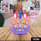 Child playing with the portable Mini Push Bubbles Game, a fun memory challenge.