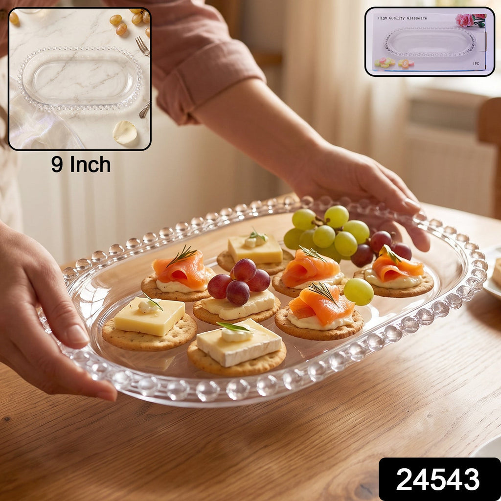 Oval glass serving platter with beaded edge for snacks and starters