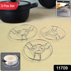 Close-up view of stainless steel wire trivets showing heat-resistant design