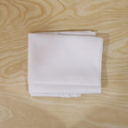 Round white table cover on a table for everyday use