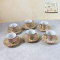 Floral porcelain tea cup and saucer set with elegant gold detailing