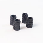 A single silver aluminium tire valve stem cap placed on a clean white background.