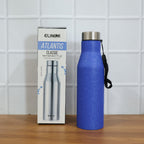 Lifestyle image of blue stainless steel water bottle 1000ML on desk
